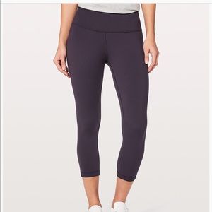 Size two turquoise Lululemon low-rise leggings